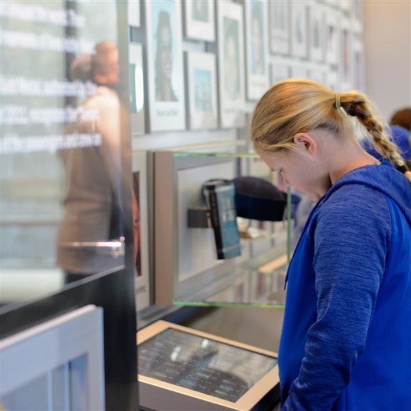 A student looking at a digital screen.