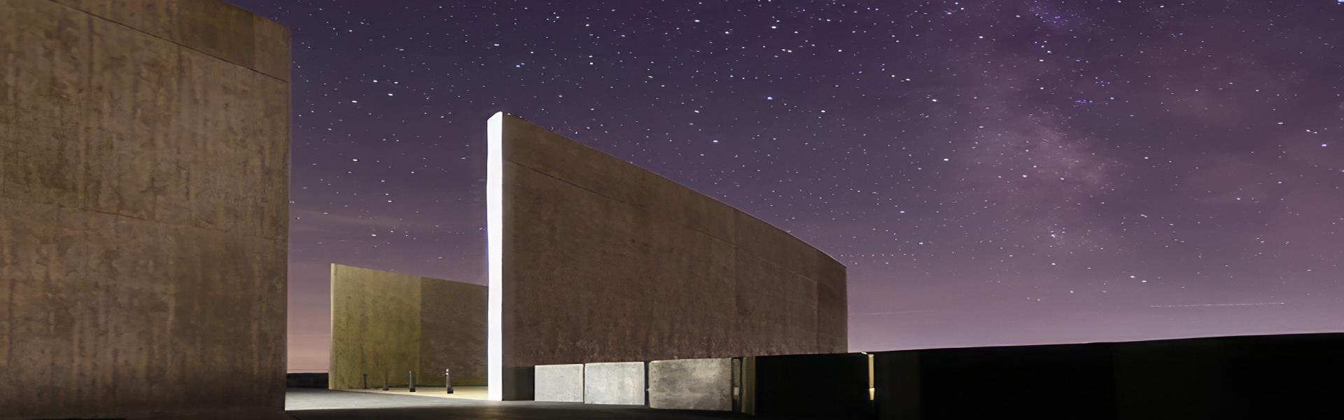 Flight 93 National Memorial at night under a purple starry sky