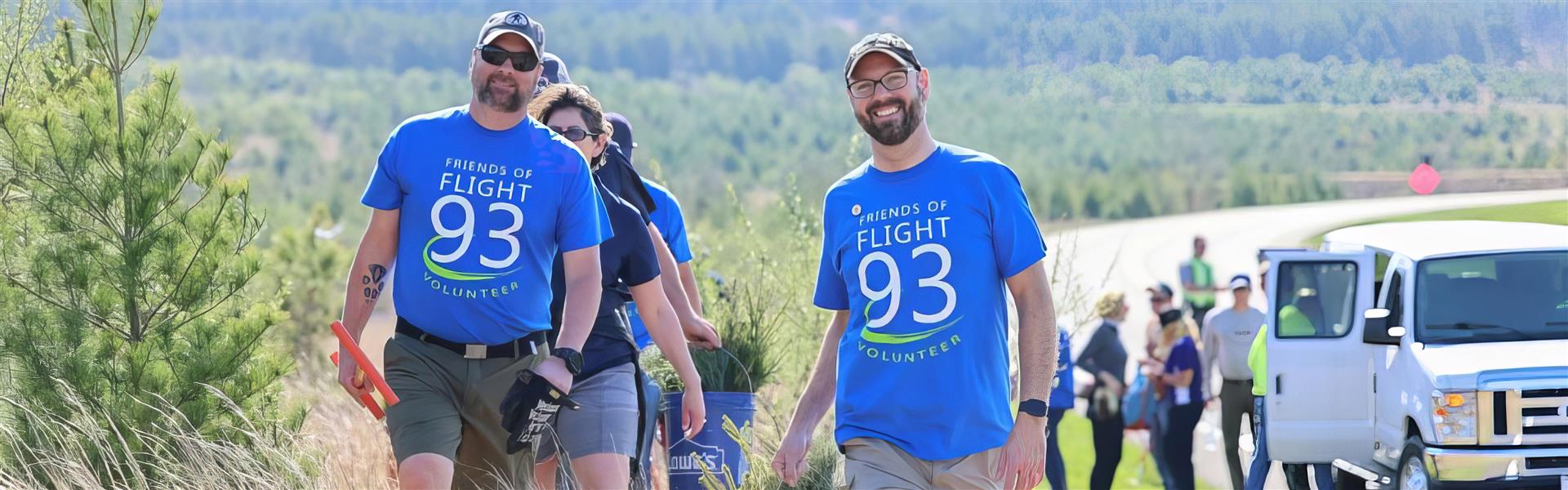 Group of volunteers walking and smiling together