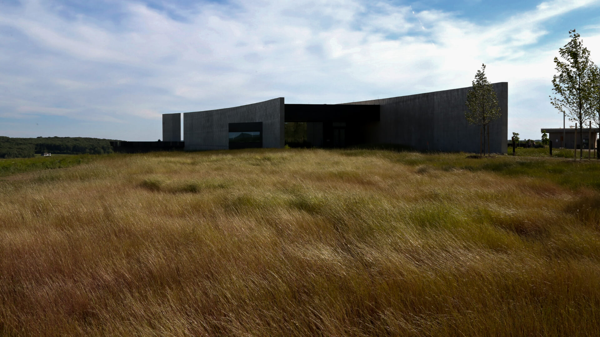 A building in a grassy field